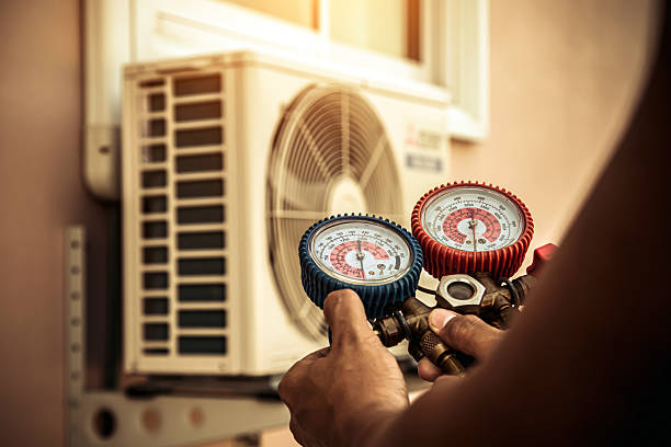 Professional Heat Pump Repair technician working in Evant, TX